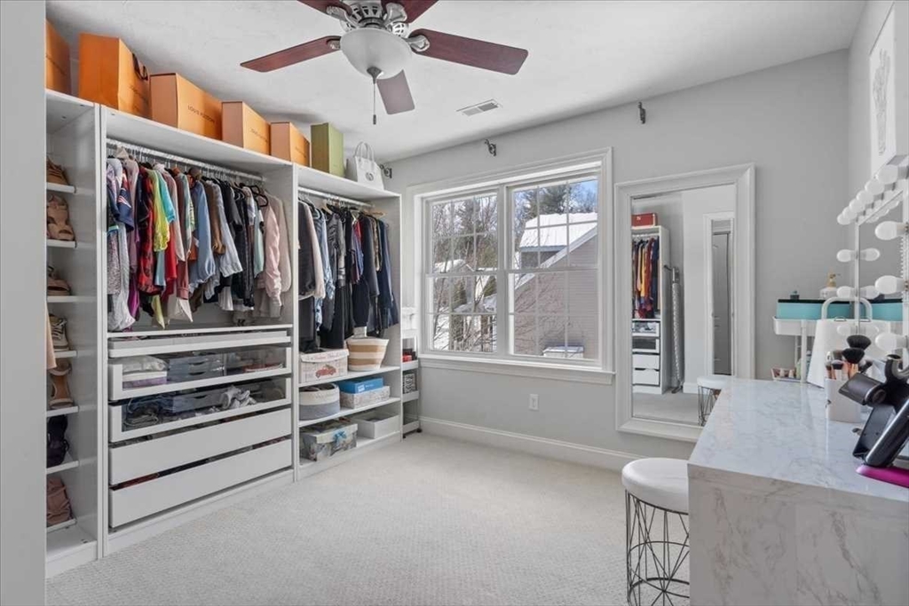 57 Partridge Hill Road Sutton, MA 01590 - Photo 19 of 40 a view of walk in closet with clothes and shoes