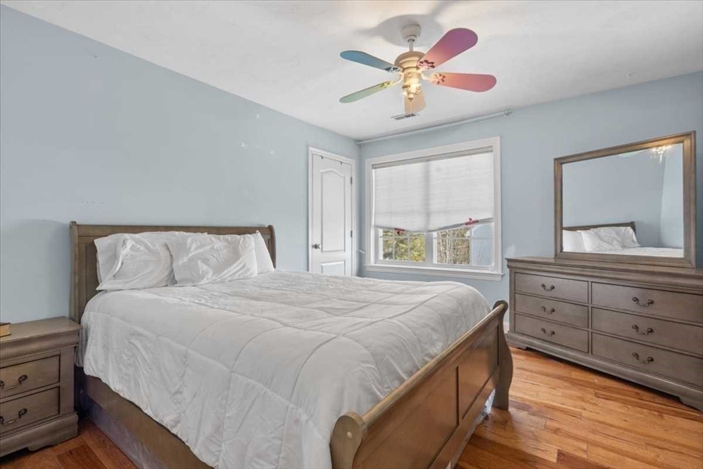 57 Partridge Hill Road Sutton, MA 01590 - Photo 21 of 40 a bedroom with a bed and a dresser