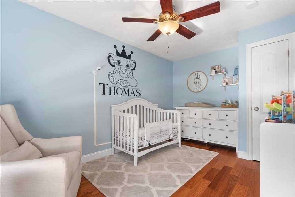 57 Partridge Hill Road Sutton, MA 01590 - Photo 22 of 40 a bedroom with furniture and a window