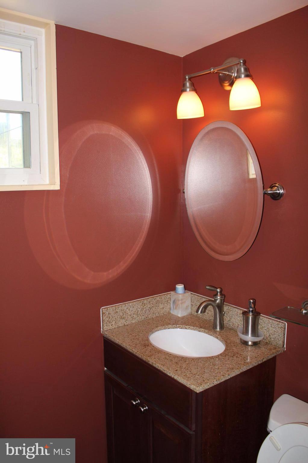 4303 Emden Street Silver Spring, MD 20906 - Photo 16 of 29 powder room off of kitchen