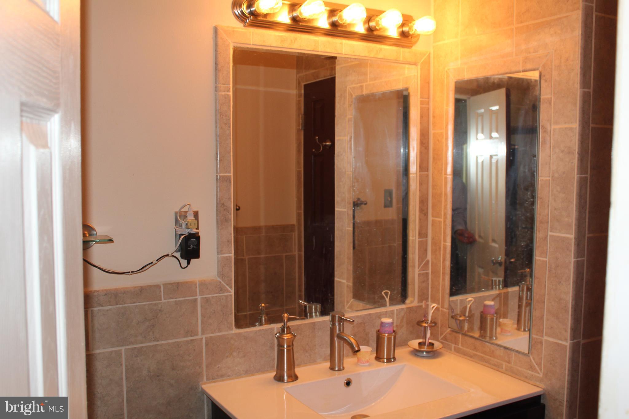 4303 Emden Street Silver Spring, MD 20906 - Photo 19 of 29 Full bathroom on upper level