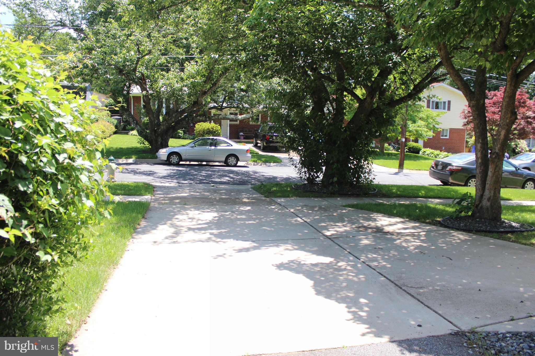 4303 Emden Street Silver Spring, MD 20906 - Photo 28 of 29 concrete double-wide driveway with 1-car carport