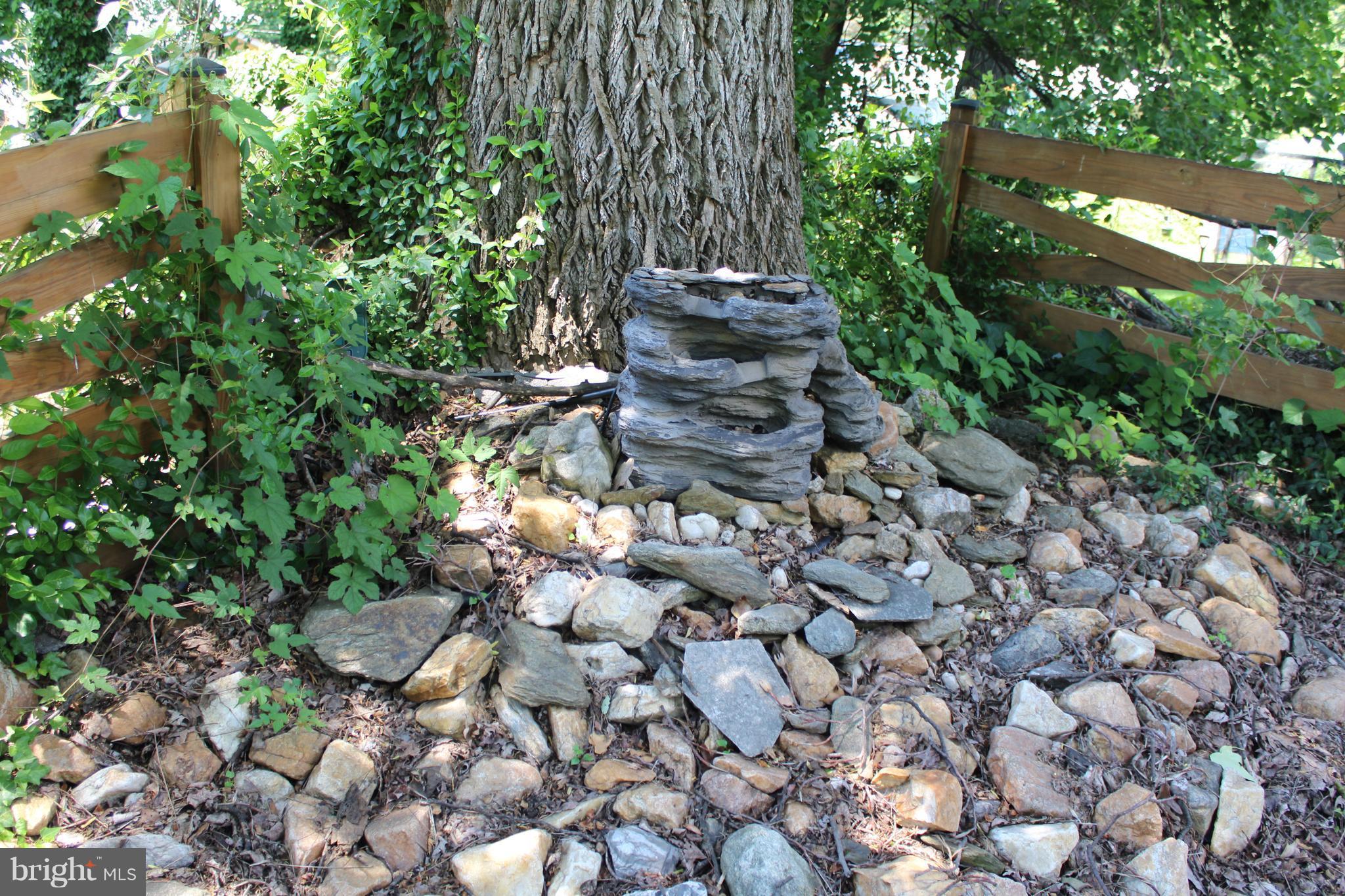 4303 Emden Street Silver Spring, MD 20906 - Photo 29 of 29 Working stone water fountain in rear yard