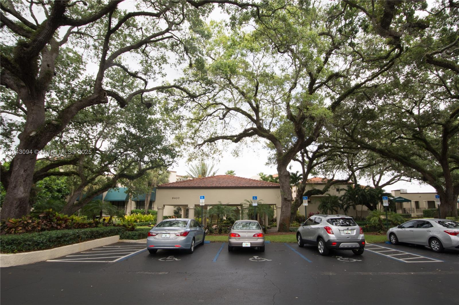 1717 Whitehall Drive, Unit 201 Davie, FL 33324 - Photo 18 of 18 a view of car parked on the side of a street