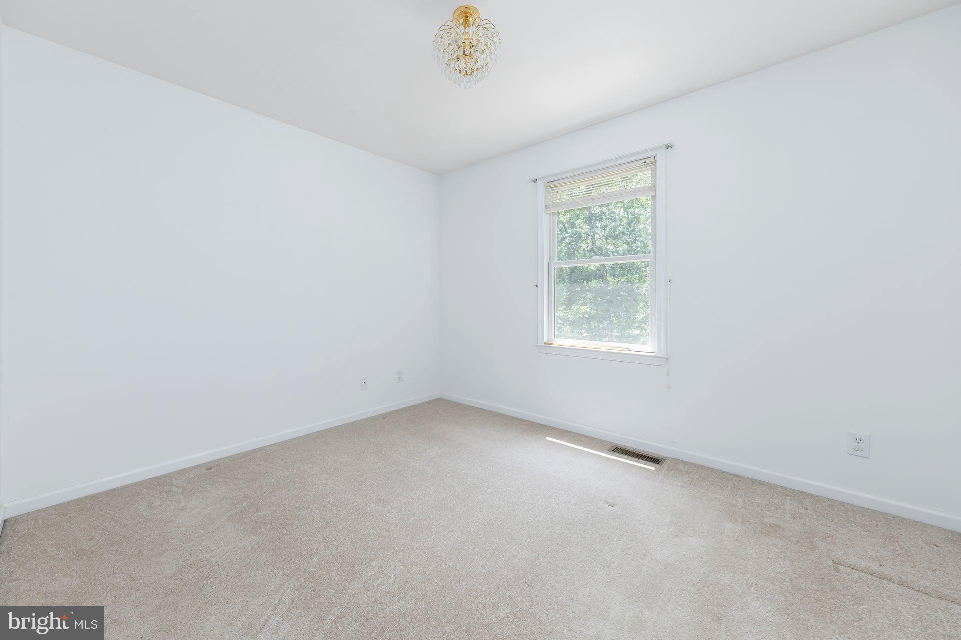 164 Clarks Pond Road Bridgeton, NJ 08302 - Photo 33 of 38 an empty room with a window