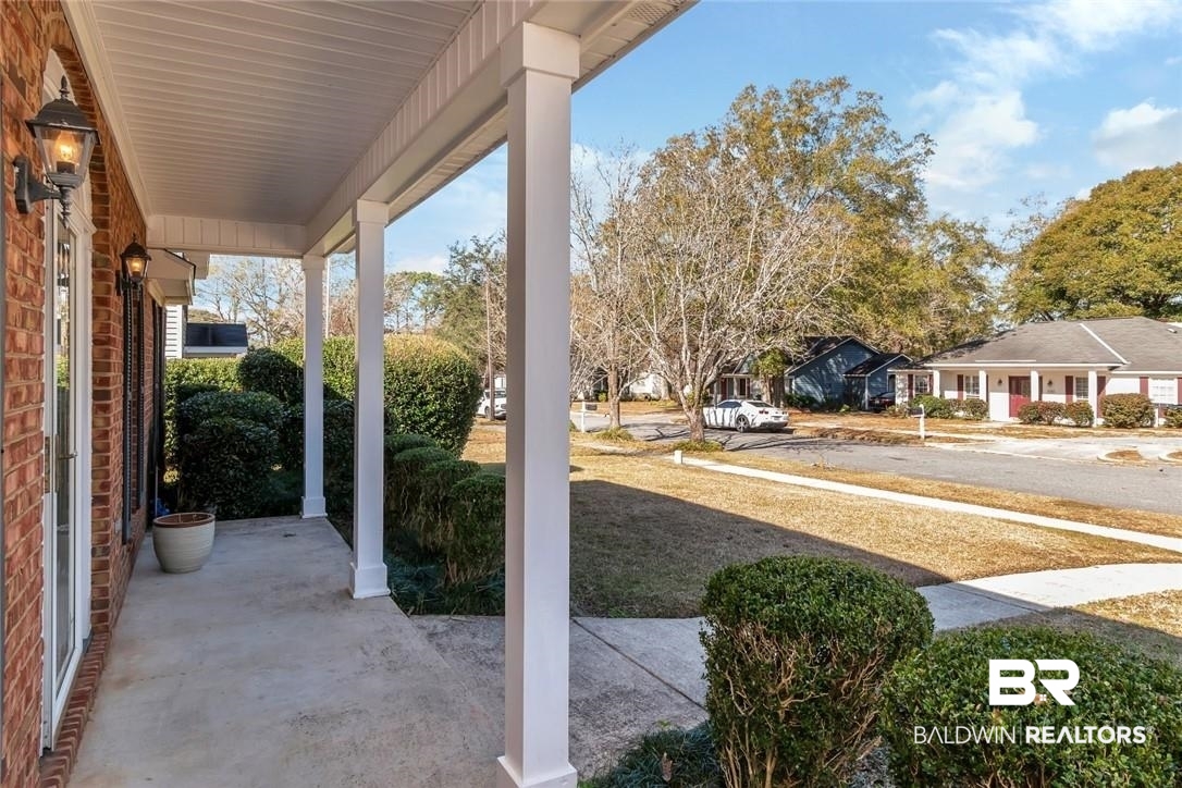 6601 Conde Court Mobile, AL 36695 - Photo 3 of 30 View of patio featuring a porch