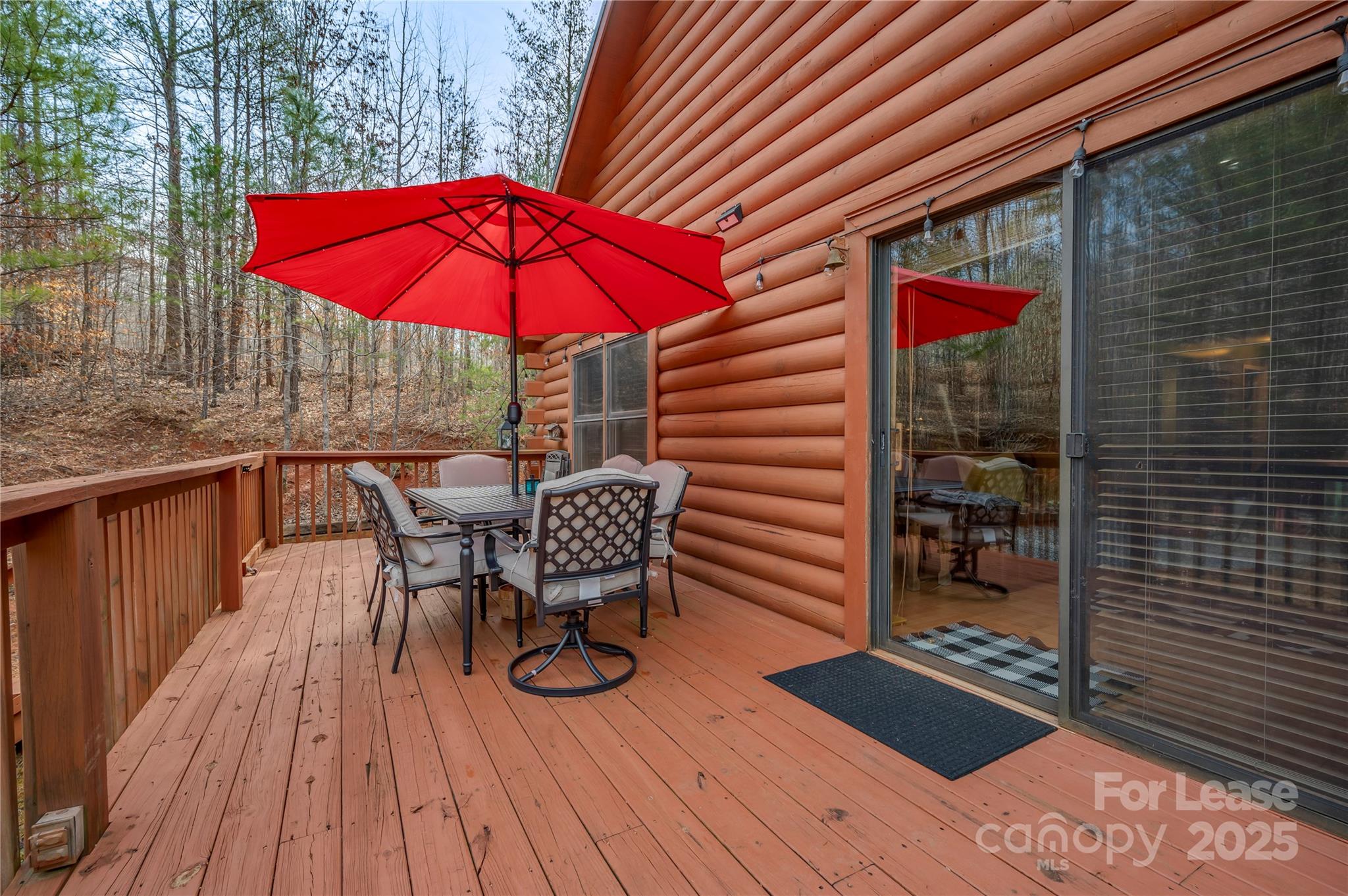 476 Front Ridge Circle Rutherfordton, NC 28139 - Photo 14 of 44 an outdoor view of patio with umbrella