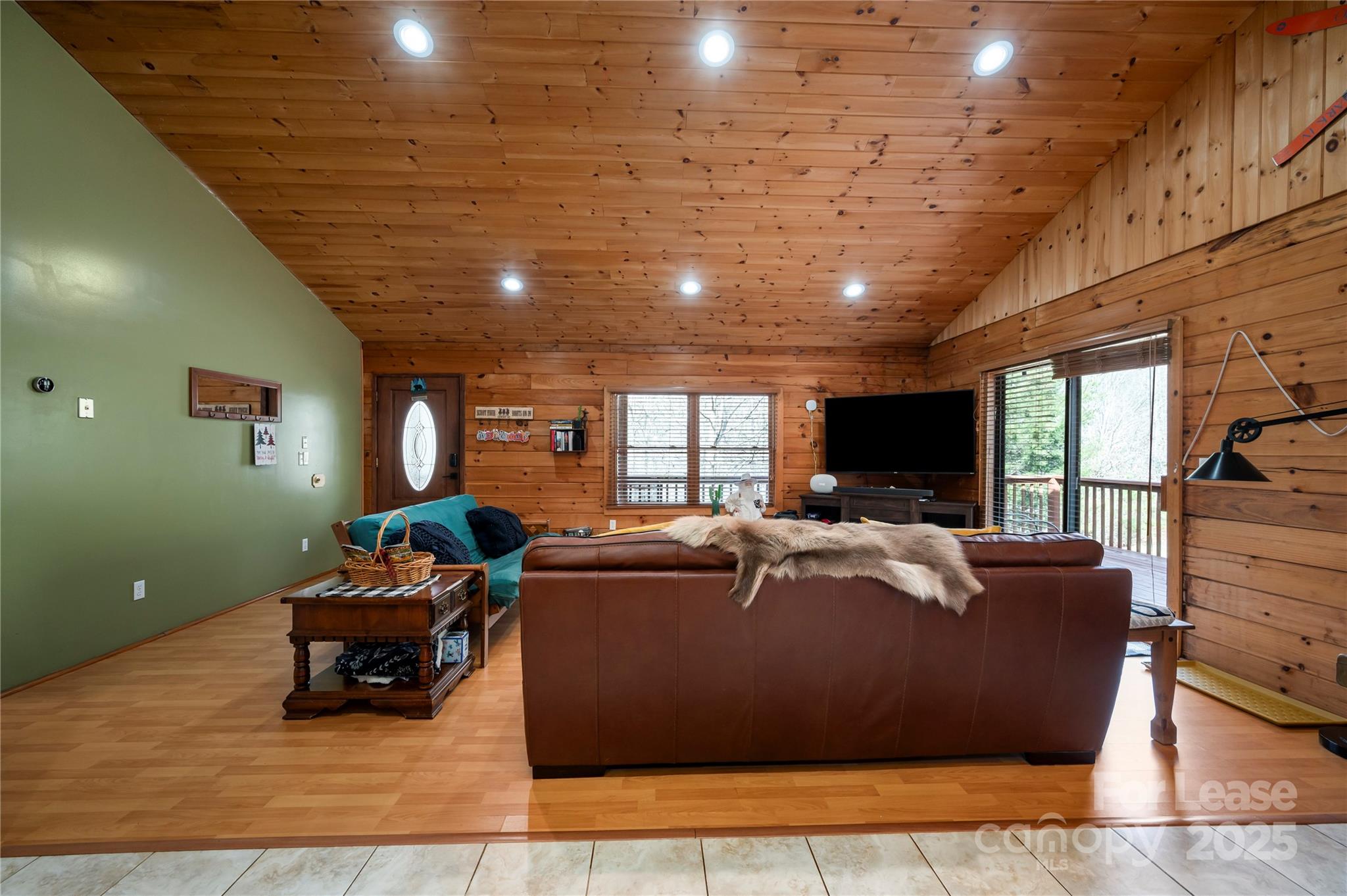 476 Front Ridge Circle Rutherfordton, NC 28139 - Photo 23 of 44 a living room with furniture and a flat screen tv
