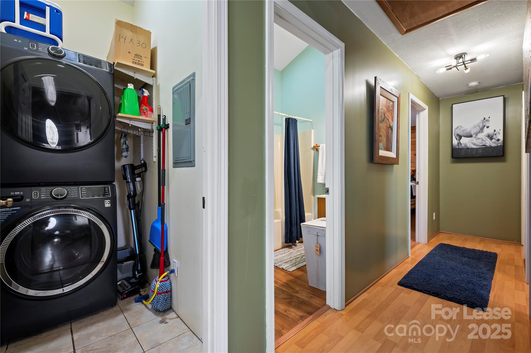 476 Front Ridge Circle Rutherfordton, NC 28139 - Photo 24 of 44 a view of a hallway to a room with washer and dryer