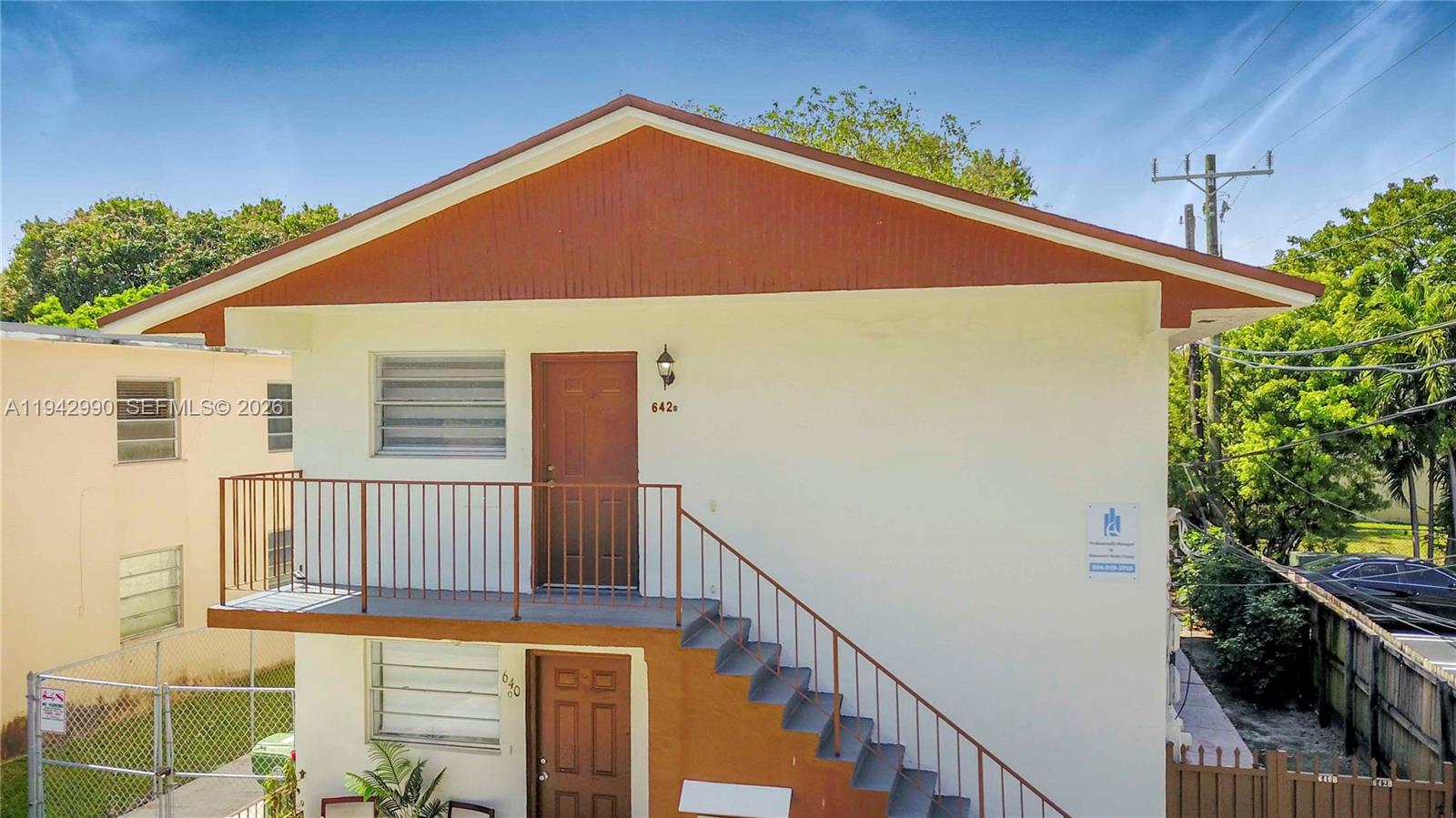 642 East 2nd Avenue, Unit A Hialeah, FL 33010 - Photo 12 of 14 a balcony view with a yard