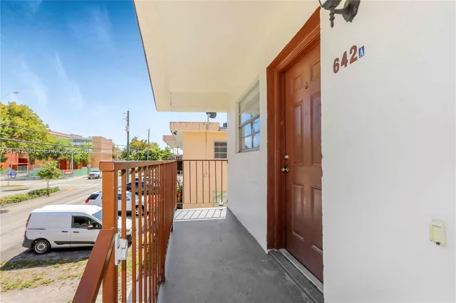 a view of a balcony with an outdoor space