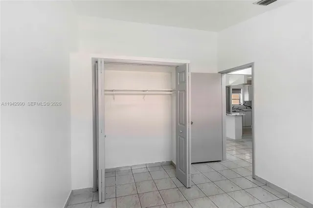 a bathroom with a sink a toilet and bathtub