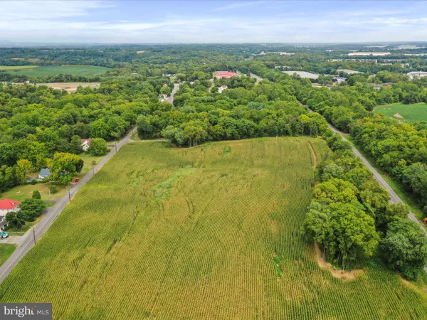 a view of a yard with an outdoor space