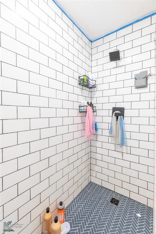 1909 River Oaks Road Abilene, TX 79605 - Photo 23 of 40 a bathroom with a shower