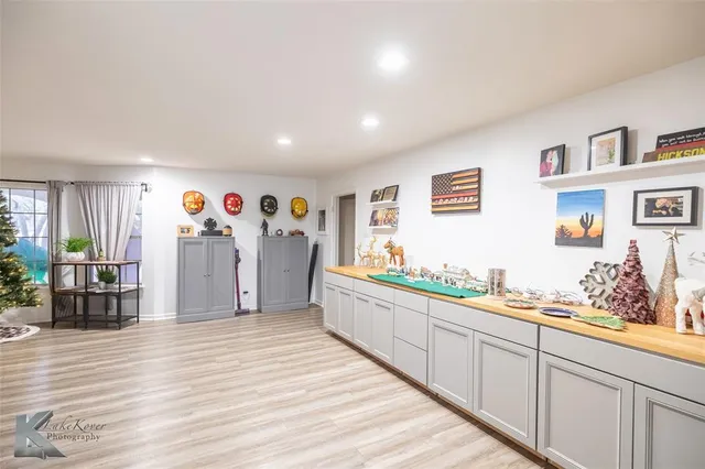 a view of a livingroom with wooden floor