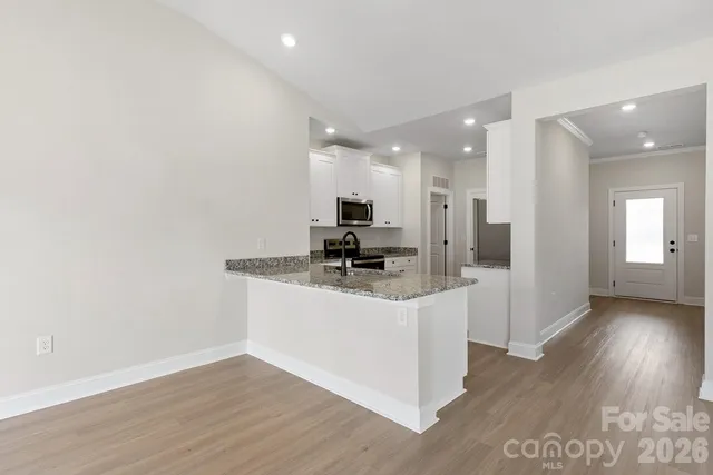 a view of kitchen with sink