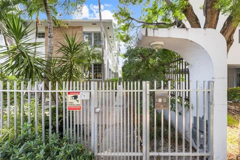 a view of street from balcony