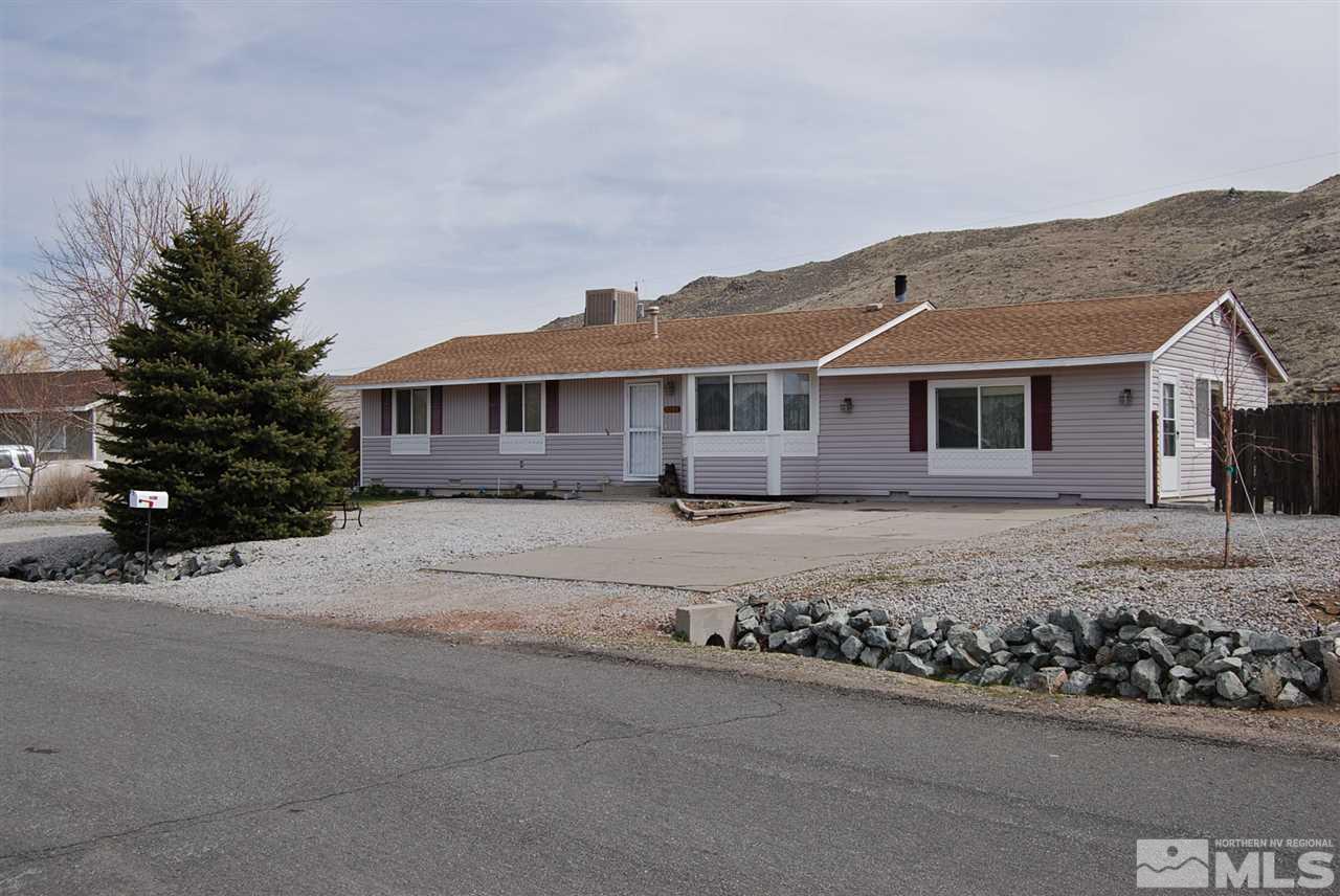 3385 Becard Lane Reno, NV 89508 - Photo 1 of 1 a front view of a house with a garden