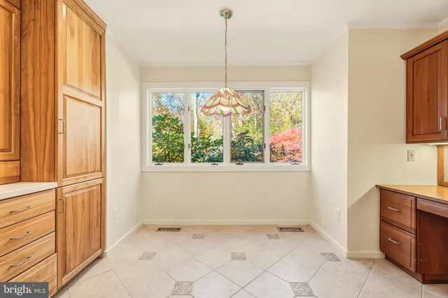 a bathroom with a sink a washer and dryer