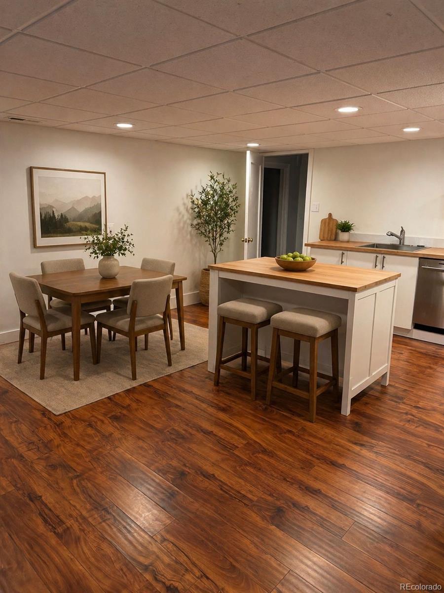 2940 19th Street Boulder, CO 80304 - Photo 1 of 10 a living room with stainless steel appliances granite countertop a table chairs and a sink