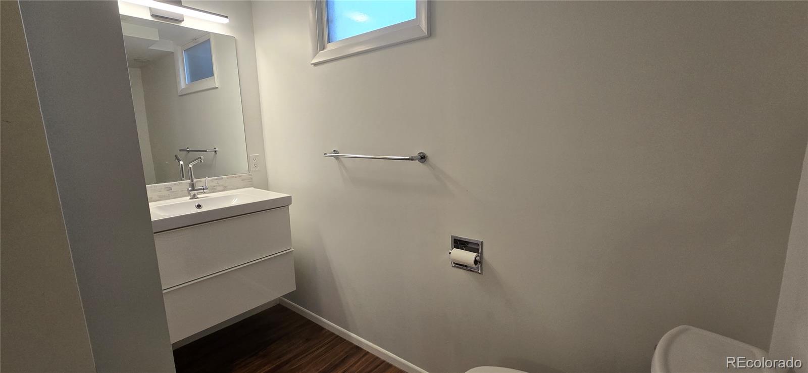 2940 19th Street Boulder, CO 80304 - Photo 6 of 10 a bathroom with a sink and mirror
