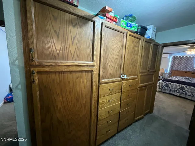 a bathroom with a window and a shower