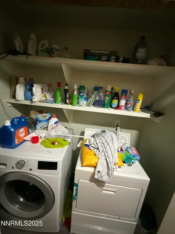 a utility room with lots of clutter and toys