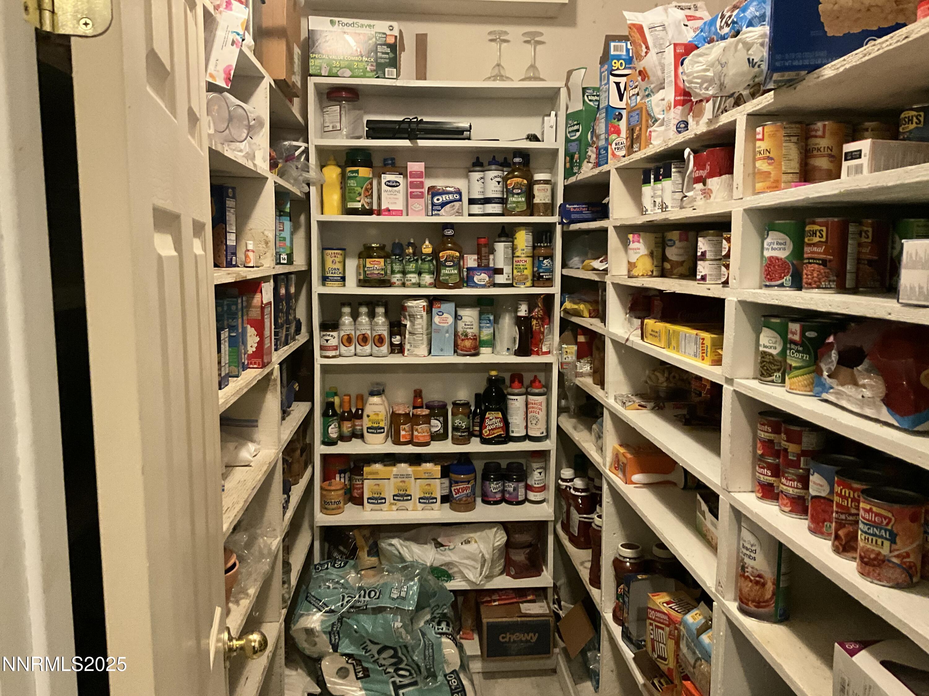 151 Bateman Street Austin, NV 89310 - Photo 2 of 33 a room with shelves and a book shelf