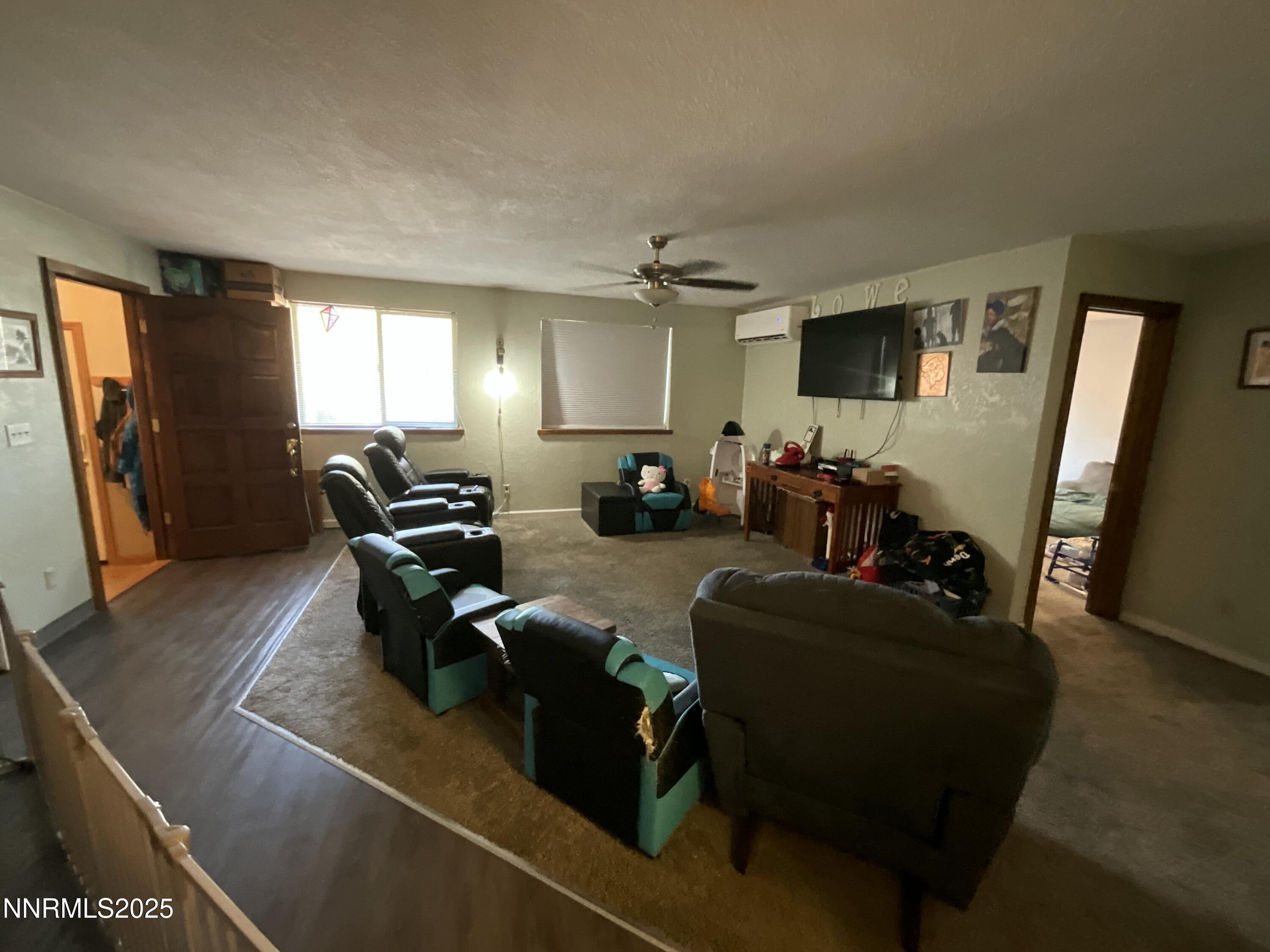 151 Bateman Street Austin, NV 89310 - Photo 7 of 33 a living room with furniture and a flat screen tv