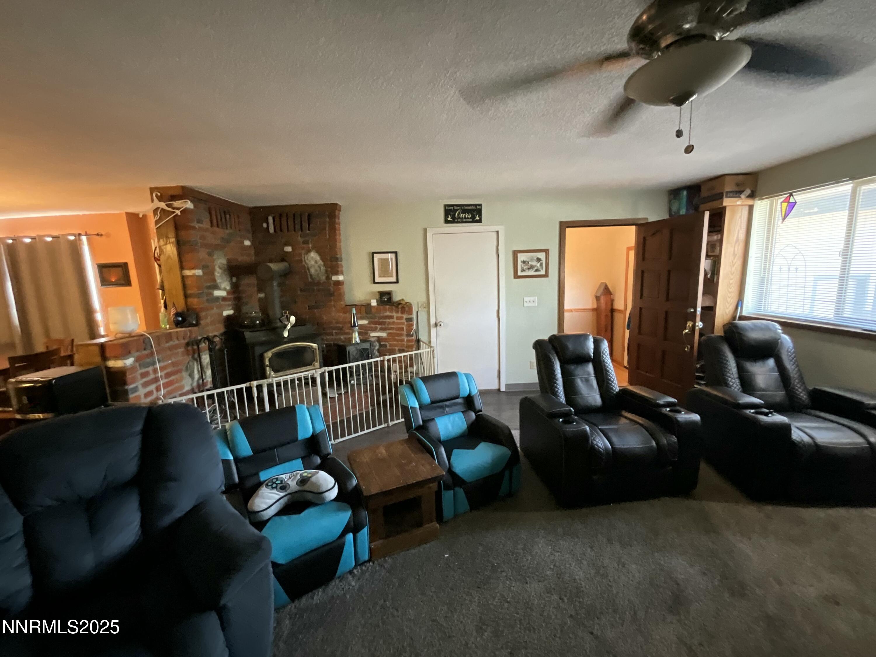 151 Bateman Street Austin, NV 89310 - Photo 8 of 33 a living room with furniture window and a flat screen tv