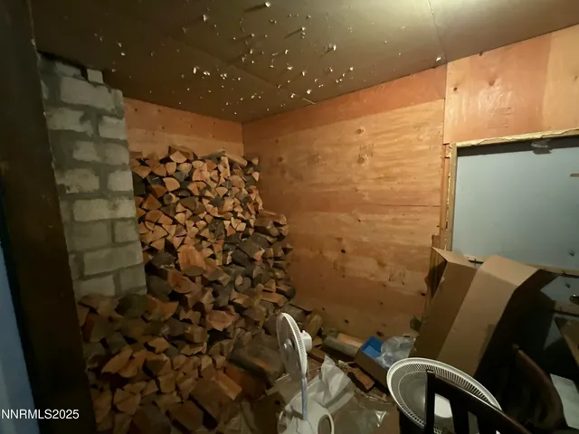 a bathroom with a toilet and shower