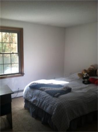 19 Randall Road Rochester, MA 02770 - Photo 17 of 19 a bedroom with a bed and a window