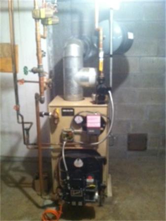 19 Randall Road Rochester, MA 02770 - Photo 18 of 19 a close view of water heater room