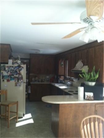 19 Randall Road Rochester, MA 02770 - Photo 8 of 19 a kitchen with a sink and a stove