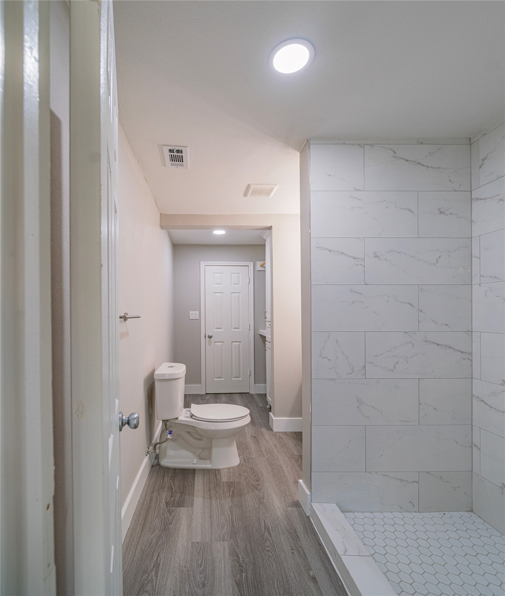 5718 Cherry Street Houston, TX 77026 - Photo 12 of 35 a bathroom with a sink and a toilet