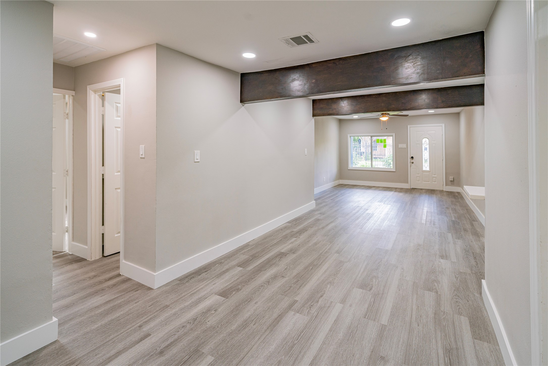 5718 Cherry Street Houston, TX 77026 - Photo 15 of 35 a view of empty room with wooden floor and fan