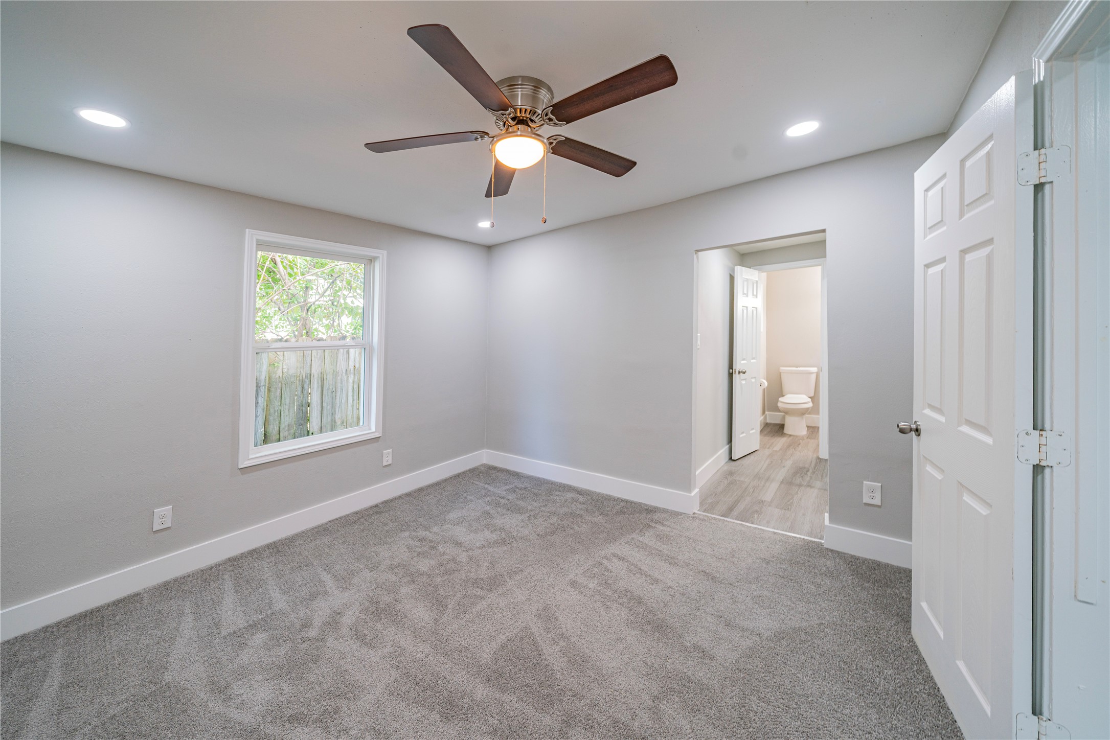 5718 Cherry Street Houston, TX 77026 - Photo 20 of 35 a view of an empty room with a window