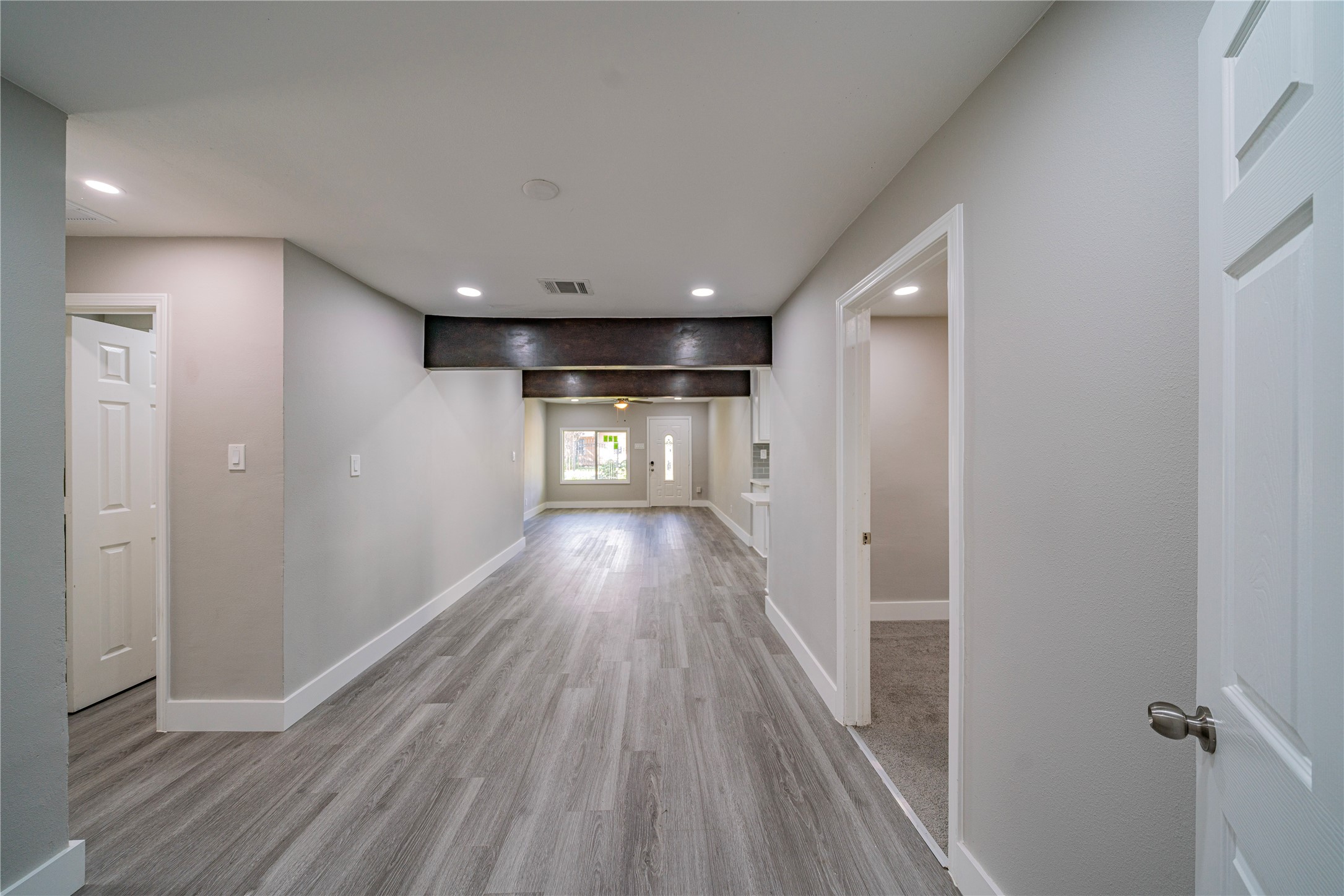 5718 Cherry Street Houston, TX 77026 - Photo 29 of 35 a view of hallway with wooden floor
