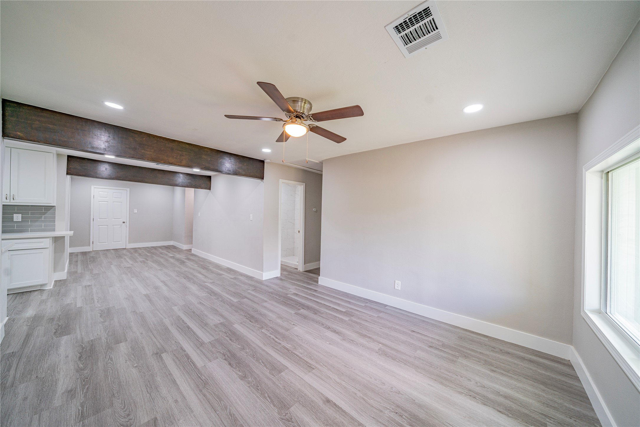 5718 Cherry Street Houston, TX 77026 - Photo 6 of 35 a view of an empty room with a window