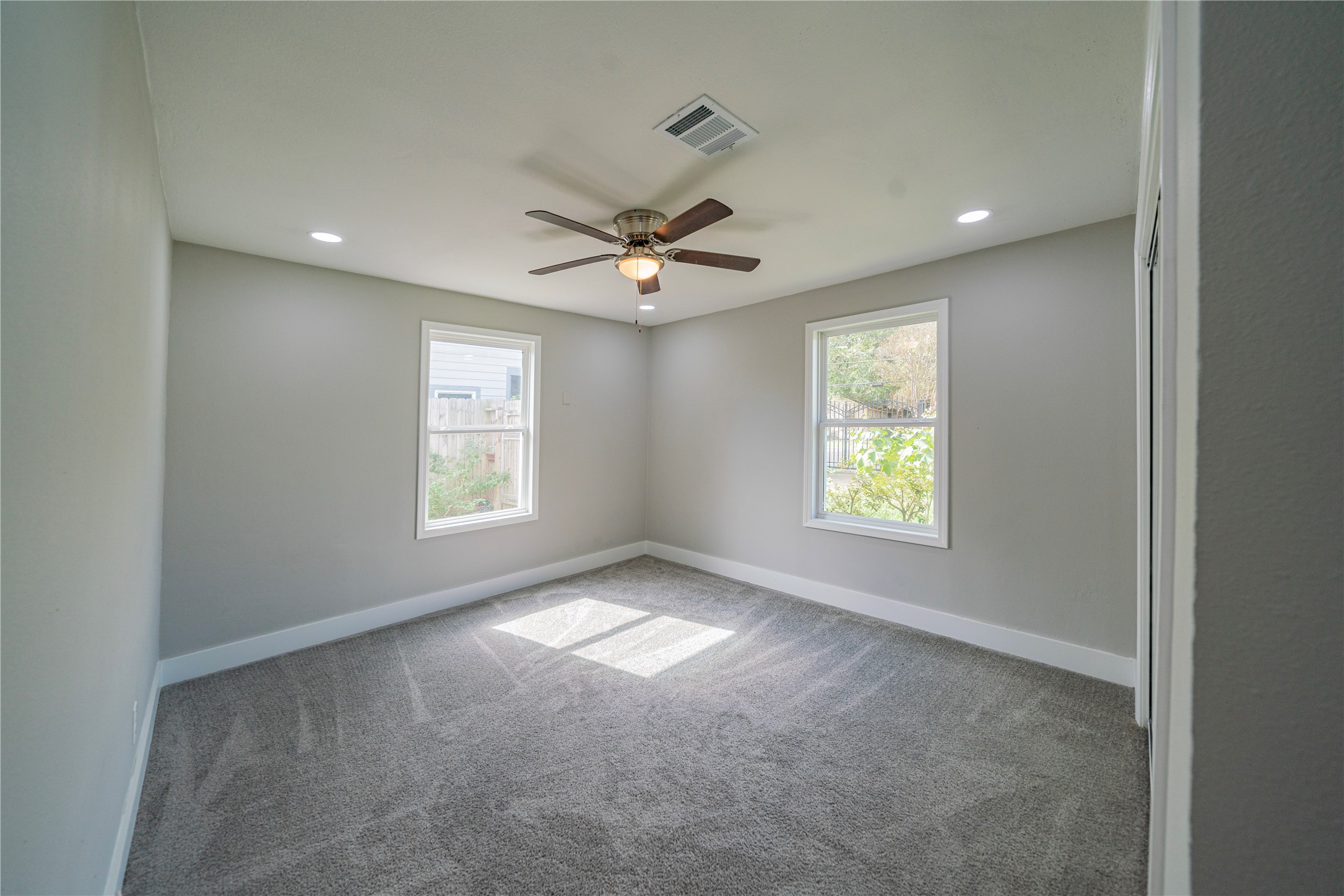 5718 Cherry Street Houston, TX 77026 - Photo 9 of 35 a view of an empty room with a window