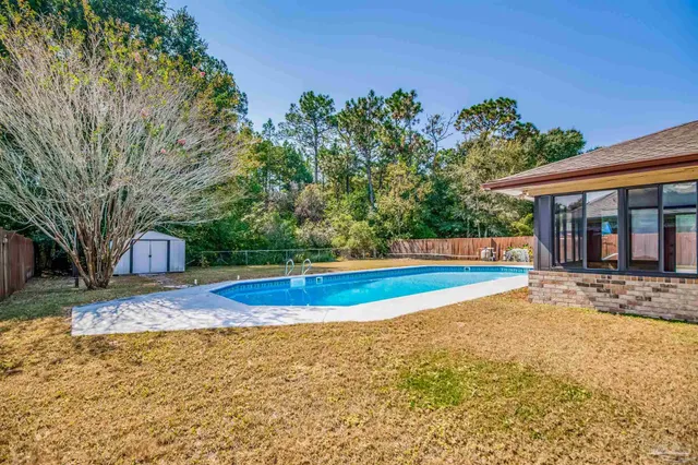 a view of outdoor space yard and swimming pool
