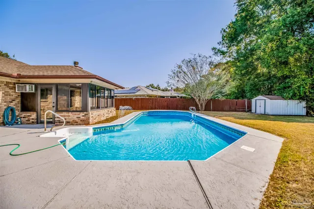 a view of a house with swimming pool