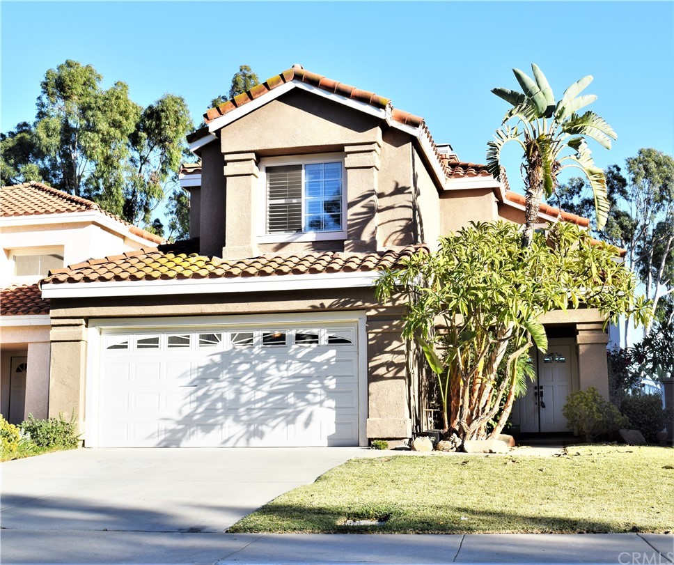17392 Sun Lake Terrace Riverside, CA 92503 - Photo 1 of 1 a front view of a house with a yard