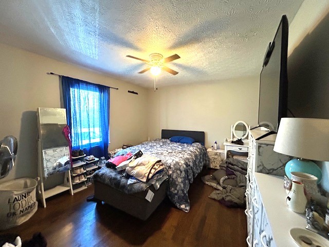 102 Cofer Drive Springfield, TN 37172 - Photo 7 of 18 a bedroom with a bed and a chandelier