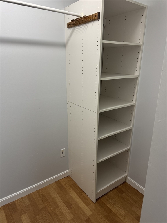 144 Kenrick Street, Unit 37 Boston, MA 02135 - Photo 10 of 12 a view of an empty walk in closet