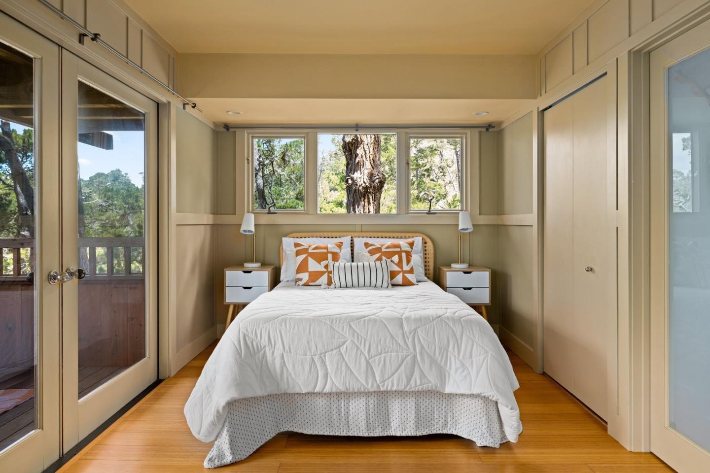 73 Mt Devon Road Carmel Highlands, CA 93923 - Photo 48 of 88 a bedroom with a bed and large window