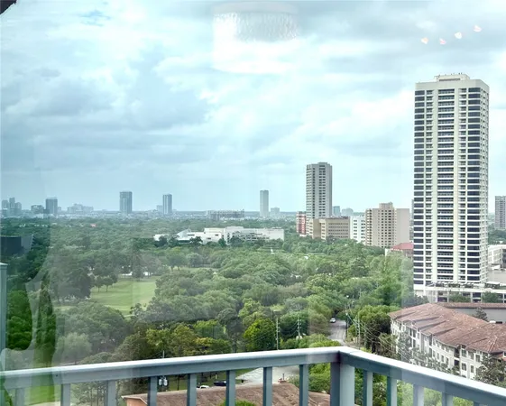 a view of a city with tall buildings