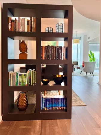 a view of living room kitchen with furniture and window