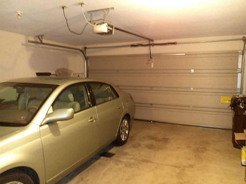 167 Nesbitt Road, Unit T12 New Castle, PA 16105 - Photo 18 of 18 Parking Lot/Garage. With pull-down storage and utility sink
