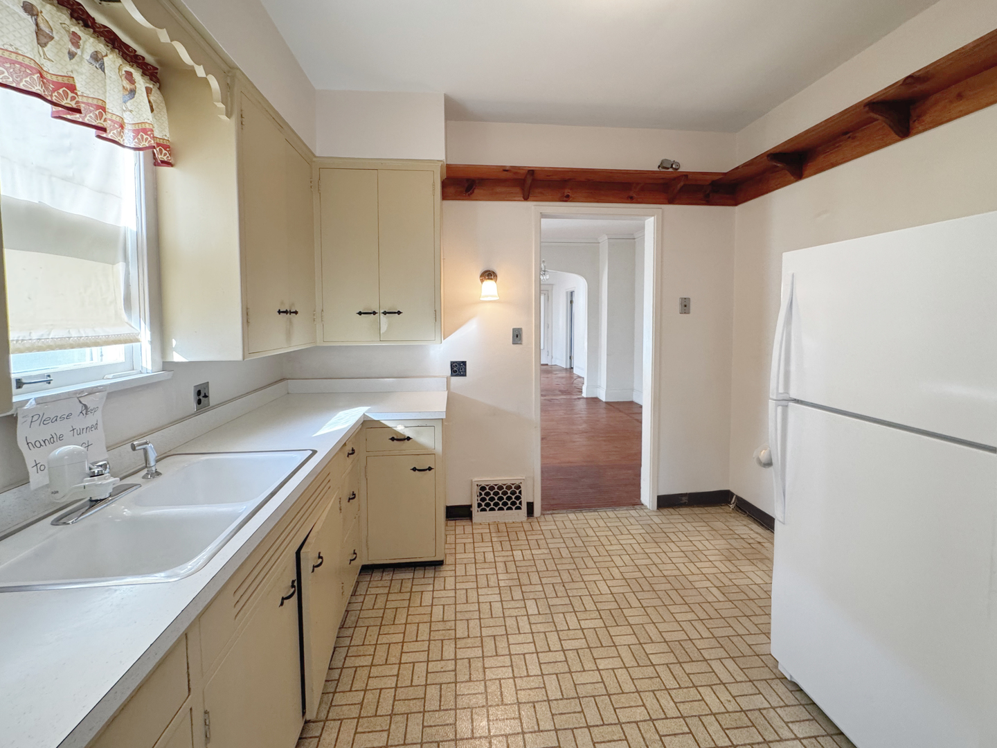 333 Elm Street Elgin, IL 60123 - Photo 11 of 25 a bathroom with a sink a toilet and mirror